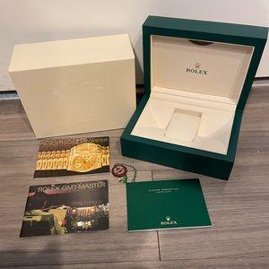 Rolex watch box with books and tag